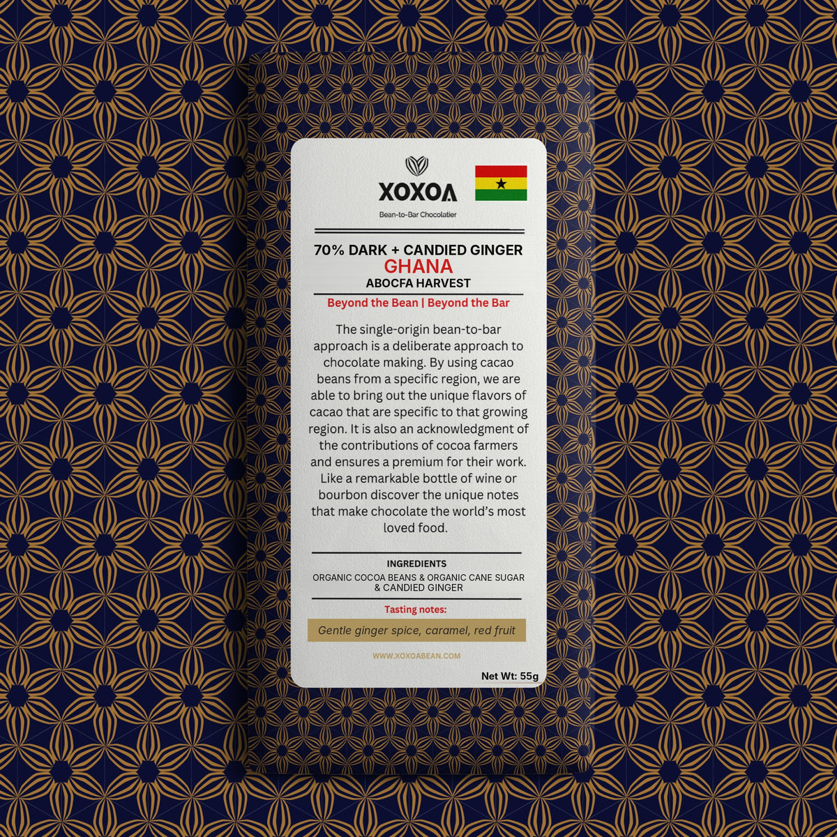 Ghana 70% dark chocolate bar with candied ginger in the navy and gold Xoxoa wrapper