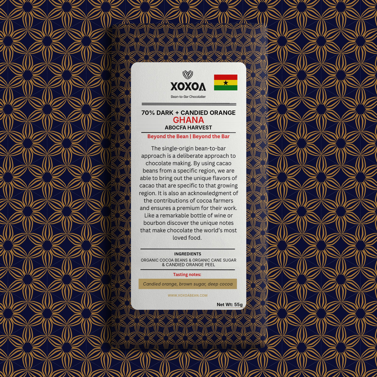 Ghana 70% dark chocolate bar with candied orange in the navy and gold Xoxoa wrapper