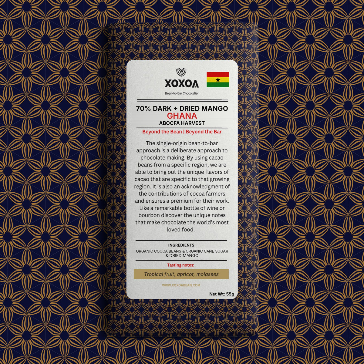 Ghana 70% dark chocolate bar with dried mango in the navy and gold Xoxoa wrapper