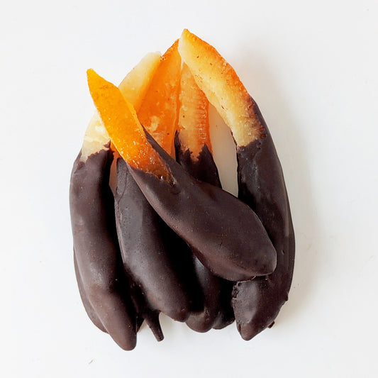 Sussade candied orange peel strips half-dipped in dark chocolate