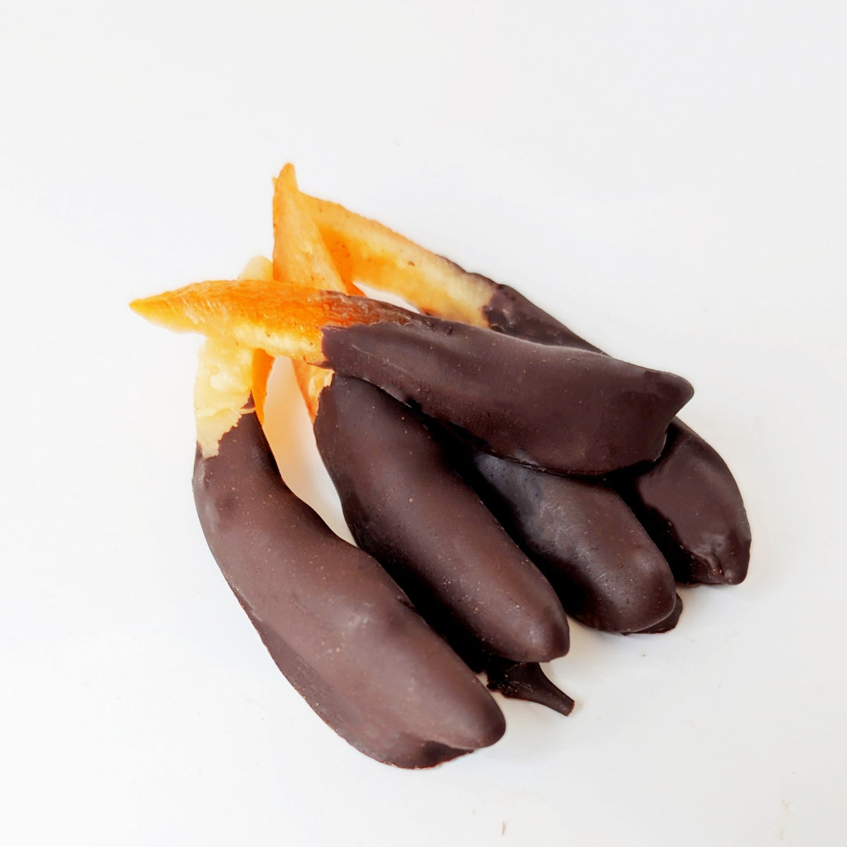 Sussade chocolate-dipped candied orange peel, side view