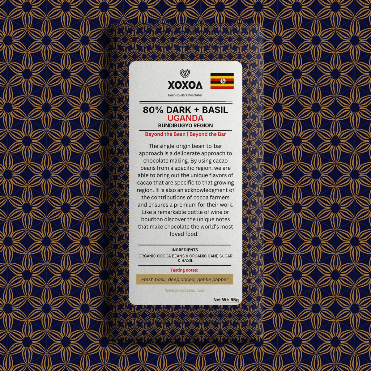 Uganda 80% dark chocolate bar with basil in the navy and gold Xoxoa wrapper